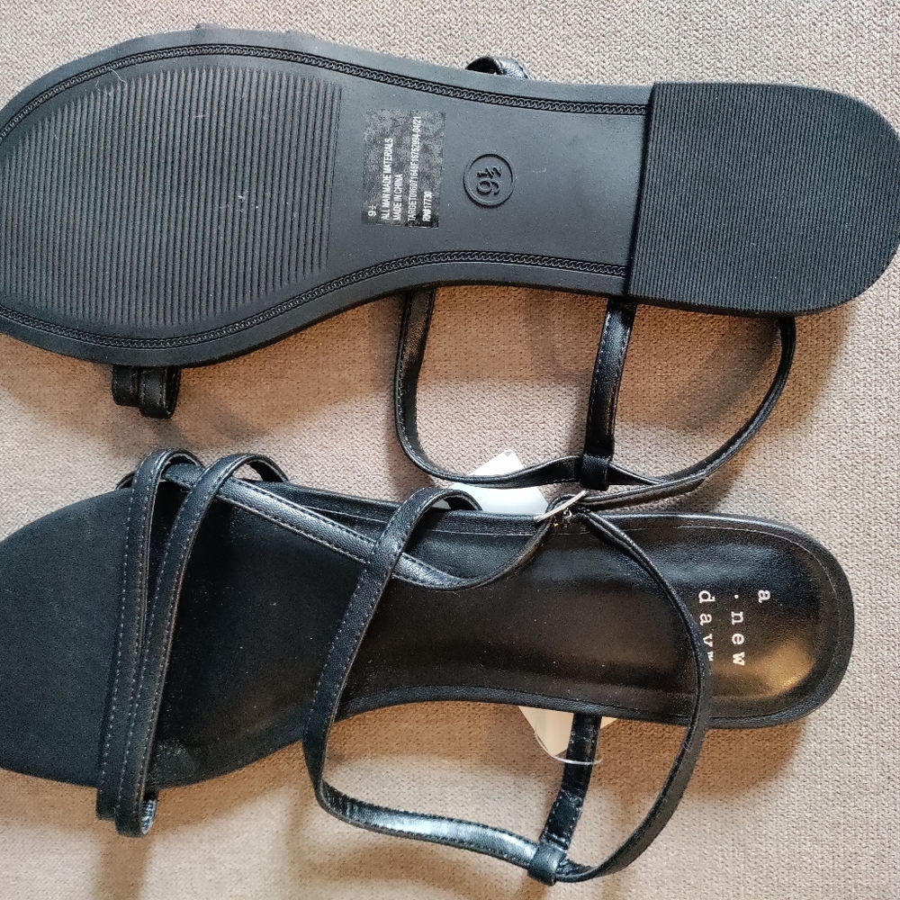 Flat black sandals